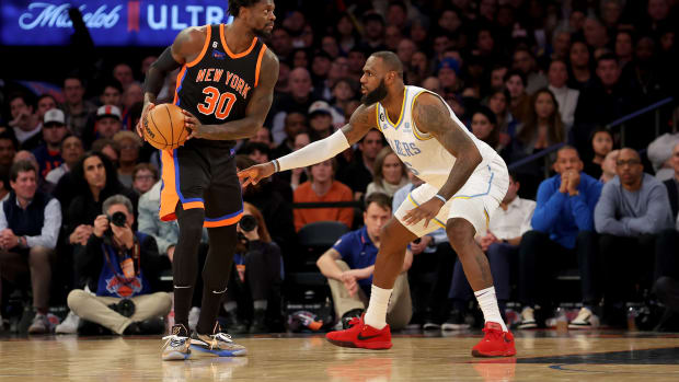 Lakers forward LeBron James defends Knicks forward Julius Randle.